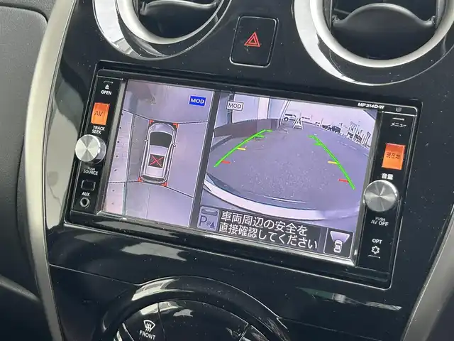 日産 ノート メダリスト エマージェンシーB 静岡県 2015(平27)年 1.7万km インペリアルアンバーP 純正7インチナビ/（Bluetooth/DVD/FM/AM/HDMI）/フルセグTV/VDC（ビークルダイナミクスコントロール）/全周囲カメラ/ETC車載器/ハーフレザーシート/スペアタイヤ/本革巻きステアリング/スマートキー/プッシュスタート/純正15AW