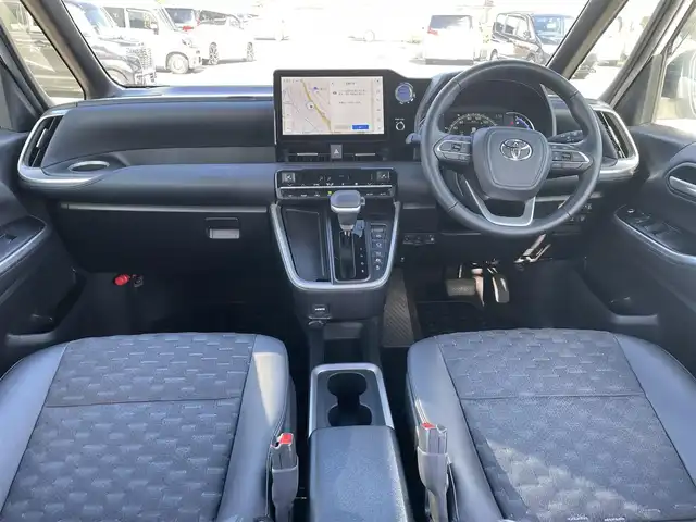 トヨタ ヴォクシー ハイブリッド S－Z 福岡県 2023(令5)年 1.7万km ホワイトパールクリスタルシャイン 純正ディスプレイオーディオナビ(フルセグTV/CD/DVD/BT)バックカメラコーナーセンサー両側パワスラクルコンドラレコETCシートヒーターブレーキホールドUSBHDMI純正フロアマット純正LED純正アルミホイールプッシュスタートスマートキーモデリスタエアロ