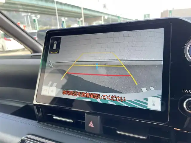 トヨタ ヴォクシー ハイブリッド S－Z 福岡県 2023(令5)年 1.7万km ホワイトパールクリスタルシャイン 純正ディスプレイオーディオナビ(フルセグTV/CD/DVD/BT)バックカメラコーナーセンサー両側パワスラクルコンドラレコETCシートヒーターブレーキホールドUSBHDMI純正フロアマット純正LED純正アルミホイールプッシュスタートスマートキーモデリスタエアロ