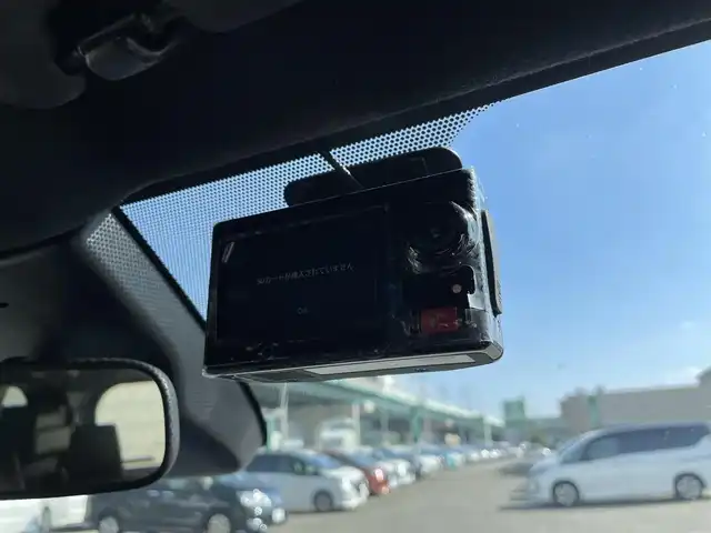 トヨタ ヴォクシー ハイブリッド S－Z 福岡県 2023(令5)年 1.7万km ホワイトパールクリスタルシャイン 純正ディスプレイオーディオナビ(フルセグTV/CD/DVD/BT)バックカメラコーナーセンサー両側パワスラクルコンドラレコETCシートヒーターブレーキホールドUSBHDMI純正フロアマット純正LED純正アルミホイールプッシュスタートスマートキーモデリスタエアロ