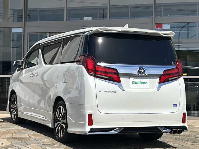 トヨタ アルファード S Cパッケージ 静岡県 2021(令3)年 5.2万km ホワイトパールクリスタルシャイン モデリスタエアロ/モデリスタマフラー/ツインムーンルーフ/T-connect SDナビゲーション/JBLサウンド/フルセグTV/全方位カメラ/純正アルミホイール/ETC/三眼LEDヘッドライト/ドライブレコーダー/デジタルインナーミラー/両側パワースライドドア/黒革シート/シートヒーター/シートベンチレーション/パワーシート/パワーバックドア/トヨタセーフティセンス/レーダークルーズコントロール/プリクラッシュセーフティ/レーントレーシングアシスト/ロードサインアシスト/ハイビームアシスト/ブラインドスポットアシスト/パーキングアシストブレーキ/クリアランスソナー/ステアリングヒーター/パーキングアシスト