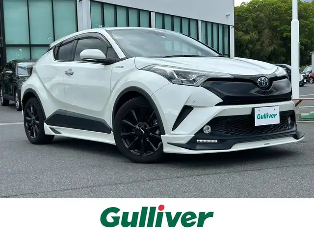 トヨタ Ｃ－ＨＲ G LEDエディション 奈良県 2018(平30)年 4万km ホワイトパールクリスタルシャイン 純正ナビ(NSZT-Y66T)/(AM/FM/CD/DVD/BT/フルセグTV/SD)/TRDフルエアロ/TRD16インチAW/ハーフレザーシート/シートヒーター/バックカメラ/トヨタセーフティセンス/クリアランスソナー/プリクラッシュセーフティ/レーントレーシングアシスト/オートマチックハイビーム/ビルトインETC/クルーズコントロール/オートライト/電動サイドブレーキ/革巻きステアリング/ステアリングスイッチ/横滑り防止装置/前方ドライブレコーダー/プッシュスタート/電格ウインカーミラー/純正フロアマット/純正ドアバイザー