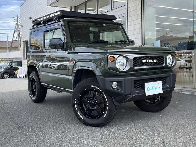 スズキ ジムニー XL 山口県 2023(令5)年 1.5万km ジャングルグリーン 5速MT/カロッツェリアナビ/Bluetooth/iPod/AUX/フルセグTV/ＭＩＤ１６インチアルミホイール×５本　/純正オプションレトログリル　/リフトアップサスペンション　/D/N席シートヒーター　/ルーフラック　/ＬＥＤヘッドライト　/ミラーヒーター　/純正フロアマット/レーンキープアシスト/ダウンヒルアシストコントロール/プッシュスタート