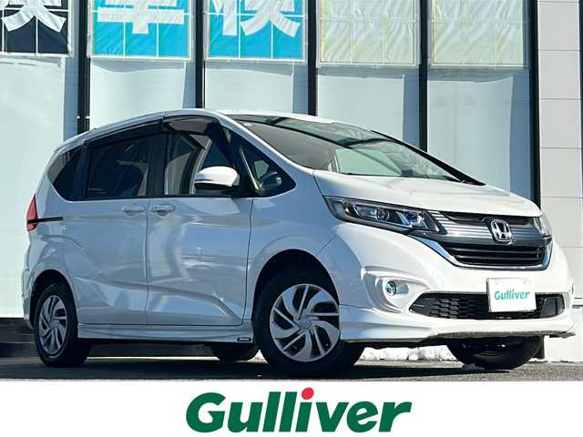 ホンダ フリード G ホンダセンシング 山形県 2017(平29)年 5.3万km ホワイトオーキッドパール 禁煙車/ワンオーナー/４WD/ホンダセンシング/Moduloエアロ（フロント、サイド）/両側パワースライドドア/Gathersメモリナビ（VXM-175VFi）/（Bluetooth/CD/DVD/フルセグ)/バックカメラ/LEDオートライト/フォグランプ/シートヒーター/ウッドパネル/純正フロアゴムマット/ビルトインETC/取扱説明書/保証書/スペアキー×１/ドアバイザー