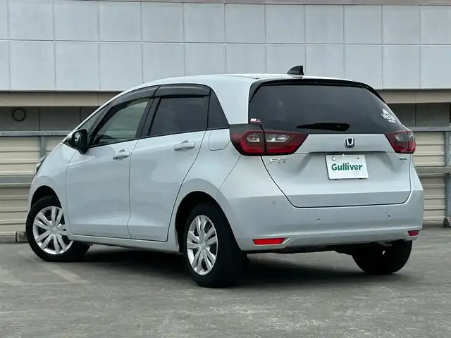 ホンダ フィット e:HEVベーシック 静岡県 2023(令5)年 6.8万km プレミアムサンライトホワイトパール ホンダセンシング/純正ＧＡＴＨＥＲＳナビ/・CD/Bluetooth/USB/LEDヘッドライト/スマートキー/・プッシュスタート/クルーズコントロール追従有/オートライト/オートマチックハイビーム/純正フロアマット/電子制御パーキングブレーキ