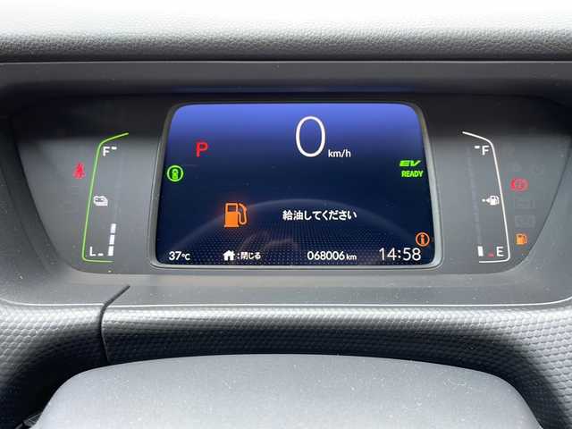 ホンダ フィット e:HEVベーシック 大阪府 2023(令5)年 6.8万km プレミアムサンライトホワイトパール ホンダセンシング/純正ＧＡＴＨＥＲＳナビ/・CD/Bluetooth/USB/バックカメラ/ETC/LEDヘッドライト/スマートキー/プッシュスタート/クルーズコントロール追従有/オートライト/オートマチックハイビーム/純正フロアマット/衝突被害軽減システム/レーンキープアシスト