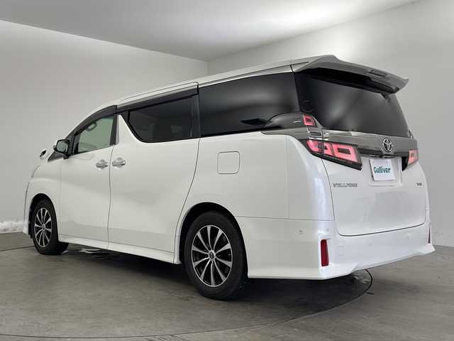 トヨタ ヴェルファイア ZG 兵庫県 2018(平30)年 13.9万km ホワイトパールクリスタルシャイン ・純正SDナビ/　Bluetoothオーディオ　/　CD/DVD再生/　SDミュージックサーバー/　フルセグテレビ/・バックカメラ/・ビルドインETC2.0/・フリップダウンモニター/・Toyota Safety Sense/　プリクラッシュセーフティ/　レーンディパーチャーアラート/　オートマチックハイビーム/・先行車発進告知機能/・パーキングサポートブレーキ（前後方静止物）/・車両接近通報装置/・レザーシート/・シートヒーター/・エアシート