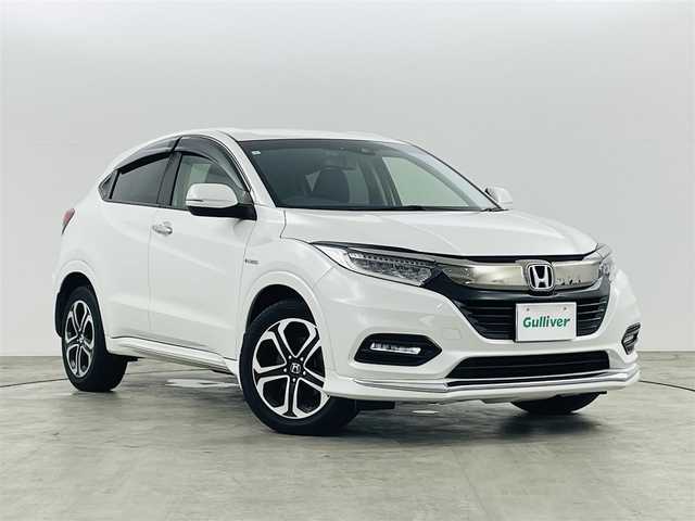 ホンダ ヴェゼル ハイブリッド Z ホンダセンシング 福島県 2019(平31)年 7.1万km プラチナホワイトパール ホンダセンシング/・CMBS/・ACC/・先行車発進告知/・路外逸脱抑制/・レーンアシスト/・リアアクティブフォースペダル/・標識認機能/４ＷＤ　/純正メモリナビゲーション/【AM/FM/DVD/CD/Bluetooth/フルセグ/HDMI】　/型番:VXM-187VFI/ＥＴＣ/ドライブレコーダー　/ハーフレザーシート　/電子パーキング　/・ブレーキホールド　/シートヒーター　/エンジンスターター　/・プッシュスタート　/・スマートキー/LEDライト/・オートライト/・フォグライト/純正フロアマット/ドアバイザー/電動格納ウィンカーミラー/パドルシフト/取扱説明書/・保証書