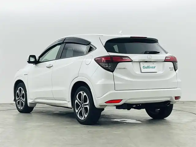 ホンダ ヴェゼル ハイブリッド Z ホンダセンシング 福島県 2019(平31)年 7.1万km プラチナホワイトパール ホンダセンシング/・CMBS/・ACC/・先行車発進告知/・路外逸脱抑制/・レーンアシスト/・リアアクティブフォースペダル/・標識認機能/４ＷＤ　/純正メモリナビゲーション/【AM/FM/DVD/CD/Bluetooth/フルセグ/HDMI】　/型番:VXM-187VFI/ＥＴＣ/ドライブレコーダー　/ハーフレザーシート　/電子パーキング　/・ブレーキホールド　/シートヒーター　/エンジンスターター　/・プッシュスタート　/・スマートキー/LEDライト/・オートライト/・フォグライト/純正フロアマット/ドアバイザー/電動格納ウィンカーミラー/パドルシフト/取扱説明書/・保証書