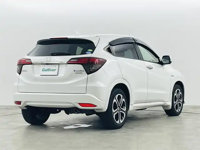 ホンダ ヴェゼル ハイブリッド Z ホンダセンシング 福島県 2019(平31)年 7.1万km プラチナホワイトパール ホンダセンシング/・CMBS/・ACC/・先行車発進告知/・路外逸脱抑制/・レーンアシスト/・リアアクティブフォースペダル/・標識認機能/４ＷＤ　/純正メモリナビゲーション/【AM/FM/DVD/CD/Bluetooth/フルセグ/HDMI】　/型番:VXM-187VFI/ＥＴＣ/ドライブレコーダー　/ハーフレザーシート　/電子パーキング　/・ブレーキホールド　/シートヒーター　/エンジンスターター　/・プッシュスタート　/・スマートキー/LEDライト/・オートライト/・フォグライト/純正フロアマット/ドアバイザー/電動格納ウィンカーミラー/パドルシフト/取扱説明書/・保証書