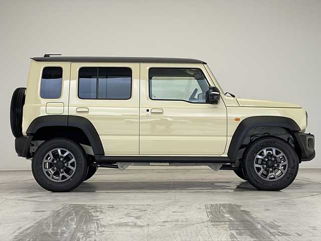 スズキ ジムニー ノマド FC 愛知県 2025(令7)年 0.1万km未満 ベージュ 登録済未使用車/衝突軽減システム/ディズプレイオーディオ　ナビ機能なし/レーダークルーズコントロール/シートヒーター/Bluetooth/コーナーセンサー/純正アルミホイール/LEDヘッドライト/オートマチックハイビーム/４WD/ステアリングスイッチ/スマートキー/プッシュスタート