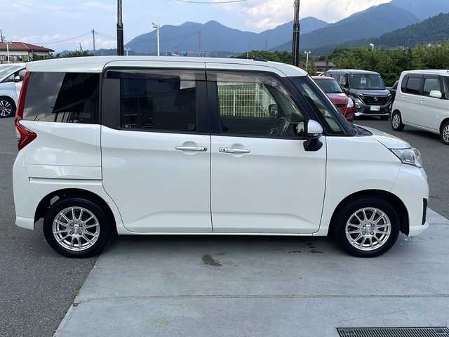 トヨタ ルーミー G 山梨県 2017(平29)年 2.8万km パールホワイトⅢ 純正ＳＤナビ　/フルセグＴＶ　/バックカメラ　/フリップダウン　/Ｂｌｕｅｔｏｏｔｈ　/ＥＴＣ　/ドラレコ　/純正フロアマット　/両側パワースライドドア　/ＡＢＳ　/横滑り防止装置　/盗難防止装置　/オートライト