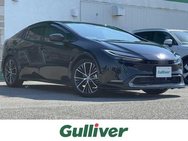 トヨタ プリウス Z 徳島県 2023(令5)年 0.2万km アティチュードブラックマイカ 純正フルエアロ(F.S.R)/純正12.3インチナビ/(AM.FM.BT.フルセグ)/パノラミックビューモニター/レーダークルーズコントロール/黒革シート/シートヒーター/エアシート/パワーシート/パワーバックドア/BSM/LEDヘッドライト/ETC2.0/デジタルインナーミラー/純正19AW/置くだけ充電