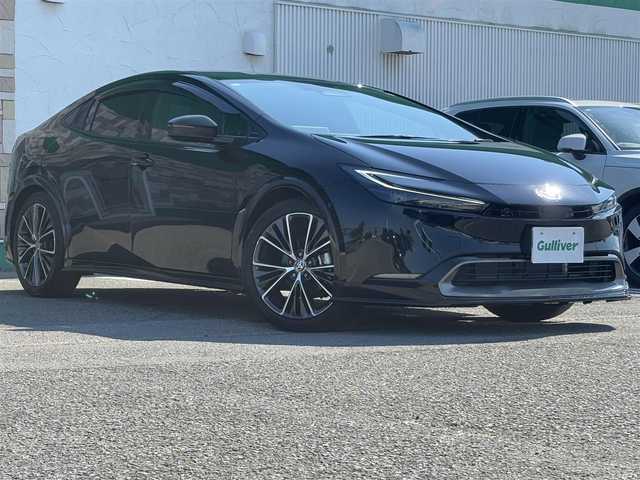 トヨタ プリウス Z 徳島県 2023(令5)年 0.2万km アティチュードブラックマイカ 純正フルエアロ(F.S.R)/純正12.3インチナビ/(AM.FM.BT.フルセグ)/パノラミックビューモニター/レーダークルーズコントロール/黒革シート/シートヒーター/エアシート/パワーシート/パワーバックドア/BSM/LEDヘッドライト/ETC2.0/デジタルインナーミラー/純正19AW/置くだけ充電