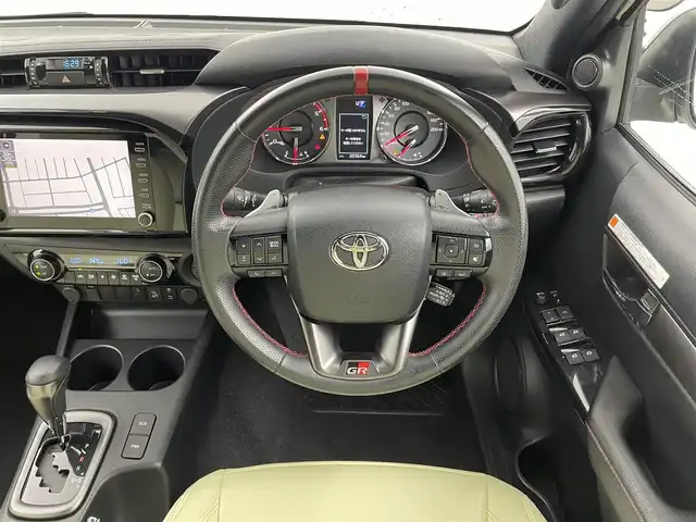 トヨタ ハイラックス Z GRスポーツ 福井県 2022(令4)年 2.1万km スーパーホワイトⅡ 純正ディスプレイオーディオ/【AM/FM/Bluetooth/フルセグTV】/全方位カメラ/ETC/衝突軽減ブレーキ/クルーズコントロール/車線逸脱警報機能/プッシュスタート/スマートキー/スペアキー/オートライト/LEDヘッドライド/LEDフォグライト/コーナーセンサー/アイドリングストップ