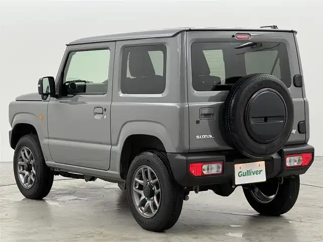 スズキ ジムニー XC 福岡県 2024(令6)年 0.7万km ミディアムグレー 衝突軽減　/レーンキープ　/４ＷＤ　/ＭＴモード付　/クルーズコントロール　/ヒルディセントコントロール　/アイドリングストップ　/シートヒーター　/ヒーテッドドアミラー　/ヘッドライトウォッシャー　/純正アルミホイール