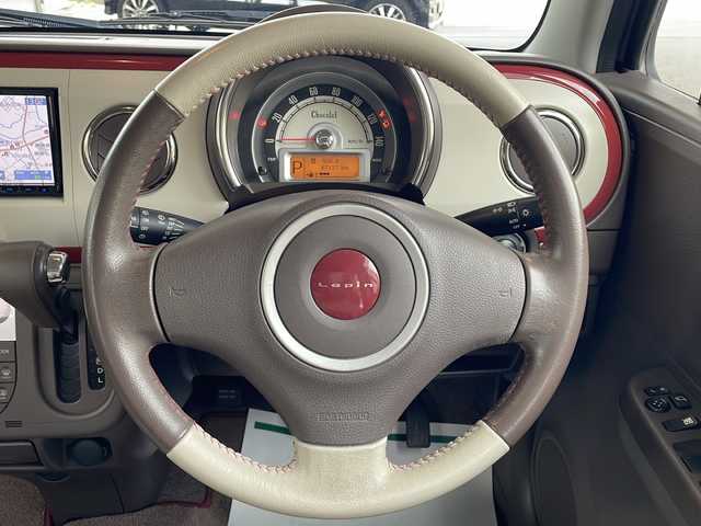 スズキ ラパン ショコラ X 福島県 2014(平26)年 6.8万km シャンパンピンクPM ワンオーナー　純正メモリナビ(ワンセグTV/CD/DVD/SD/AM/FM)　レザーシート　革巻きステアリング　アイドリングストップ　ＩＳＯＦＩＸ　オートライト　ドアバイザー　電動格納ミラー  ウィンカーミラー ＨＩＤヘッドライト　スマートキー　スペアキー×１　取扱説明書　保証書