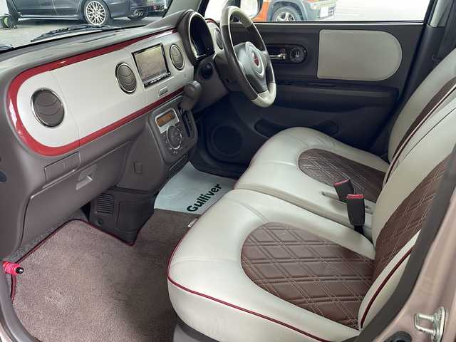 スズキ ラパン ショコラ X 福島県 2014(平26)年 6.8万km シャンパンピンクPM ワンオーナー　純正メモリナビ(ワンセグTV/CD/DVD/SD/AM/FM)　レザーシート　革巻きステアリング　アイドリングストップ　ＩＳＯＦＩＸ　オートライト　ドアバイザー　電動格納ミラー  ウィンカーミラー ＨＩＤヘッドライト　スマートキー　スペアキー×１　取扱説明書　保証書