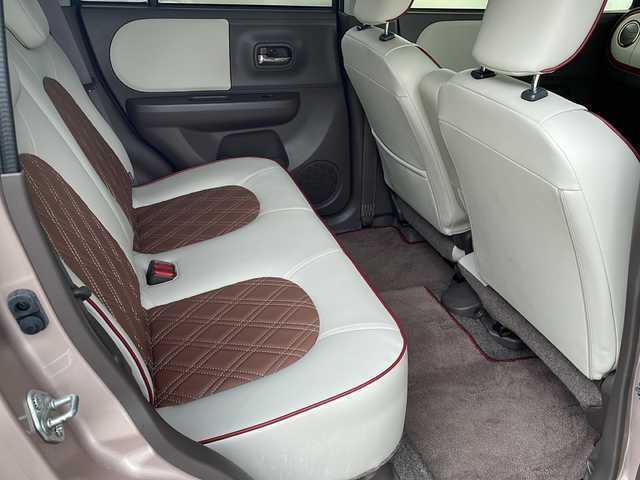 スズキ ラパン ショコラ X 福島県 2014(平26)年 6.8万km シャンパンピンクPM ワンオーナー　純正メモリナビ(ワンセグTV/CD/DVD/SD/AM/FM)　レザーシート　革巻きステアリング　アイドリングストップ　ＩＳＯＦＩＸ　オートライト　ドアバイザー　電動格納ミラー  ウィンカーミラー ＨＩＤヘッドライト　スマートキー　スペアキー×１　取扱説明書　保証書