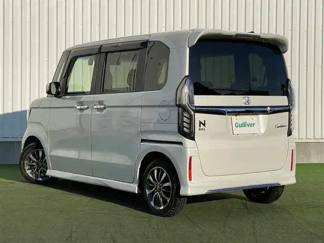 ホンダ Ｎ ＢＯＸ カスタム L 香川県 2022(令4)年 2.8万km プラチナホワイトパール 登録時走行距離 28067km/純正ナビ/→AM/FM/フルセグTV/Bluetooth/バックカメラ/ETC/アダプティブクルーズコントロール/ドライブレコーダー/電子パーキング/オートホールド/前席シートヒーター/両側パワースライドドア/純正AW/ソナー/衝突軽減ブレーキ/レーンキープアシスト/横滑り防止装置/プッシュスタート/スマートキー/スペアキー