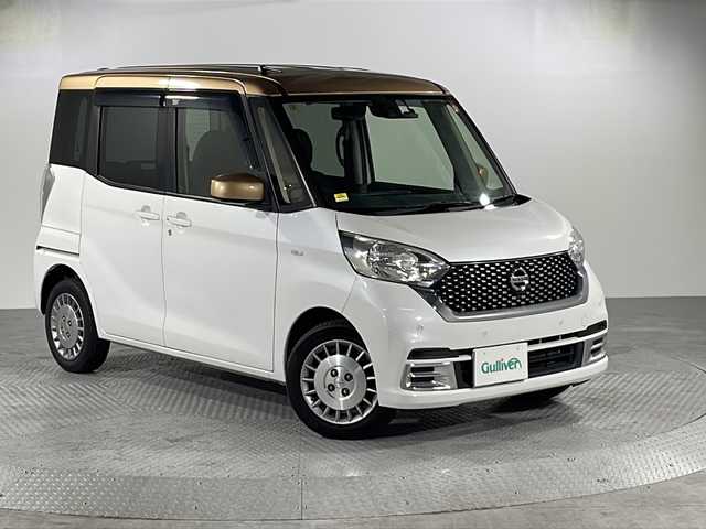 日産 デイズ ルークス ボレロ 沖縄県 2018(平30)年 7万km ピンクゴールドM/シルキーホワイト ワンオーナー/純正14AW/純正ナビ/フルセグ/バックカメラ/アラウンドビューモニター（ミラー）/ETC/ドライブレコーダー（DJ4-D）/革調シートカバー/シートヒーター（D席）/片側パワースライドドア/レーダーブレーキサポート/衝突被害軽減システム/横滑り防止装置/リアサーキュレーター/リアサンシェード/踏み間違い防止アシスト/アイドリングストップ/LEDヘッドライト/N席後部テーブル/ヘッドライトレベライザー/純正フロアマット/純正ドアバイザー/ボレロメッキグリル/保証書/取扱説明書