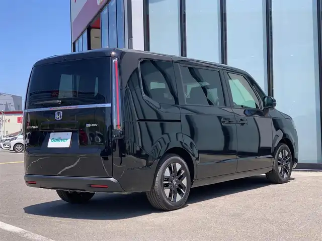 ホンダ ステップワゴン eHEV エアー 大阪府 2025(令7)年 0.1万km未満 クリスタルブラックパール 衝突軽減/両側パワースライドドア/レーダークルーズコントロール/ステアリングスイッチ/コーナーセンサー/横滑り防止装置/純正アルミホイール/プッシュスタート/スマートキー/ＵＳＢ/ＬＥＤライト