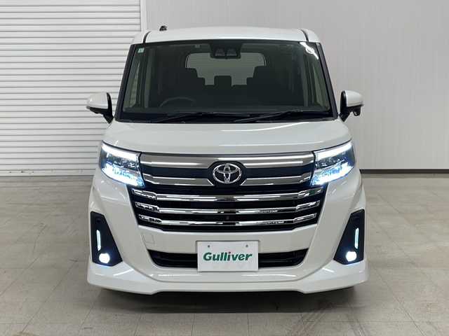 トヨタ ルーミー カスタムG－T 熊本県 2023(令5)年 3.6万km パールホワイトⅢ ワンオーナー		/純正９インチナビ/【ナビ/フルセグ/Bluetooth/DVD/】	/パノラミックビューモニター/追従型クルーズコントロール	/オートハイビーム	/LEDヘッドライト（AUTO機能付き）	/ビルトインETC	/前席シートヒーター	/運転席パワーシート	/衝突軽減ブレーキシステム	/車線逸脱防止システム	/横滑り防止装置	/踏み間違い防止装置/純正15インチアルミ	/コーナーセンサー（前後）	/純正フロアマット	/ステアリングスイッチ	/ISOFIX/チルトステアリング/シートリフター/シートバックテーブル/ウィンカーミラー/ドアバイザー	/プッシュスタート	/取扱説明書	/新車保証書/スペアキー×１