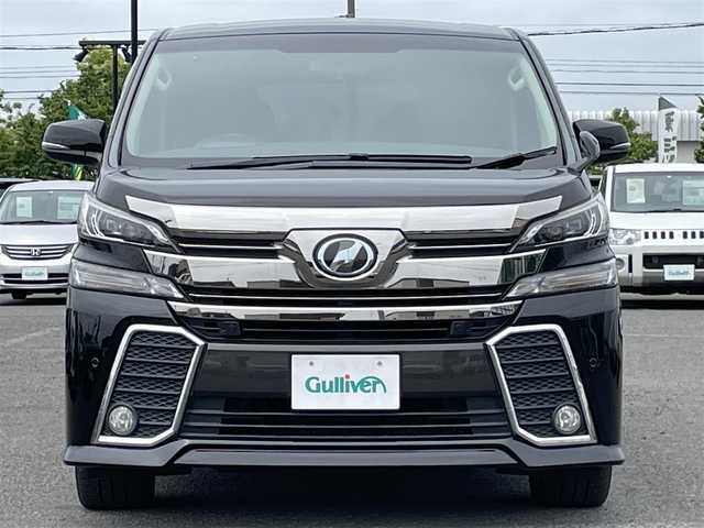 トヨタ ヴェルファイア Z Aエディション 道央・札幌 2016(平28)年 10.2万km ブラック ４WD/寒冷地仕様/社外メモリーナビ/CD/DVD/BT/フルセグ/社外フリップダウンモニター/プリクラッシュセーフティ/横滑り防止装置/レーダークルーズコントロール/クリアランスソナー/バックカメラ/ビルトインETC/アイドリングストップ/ワイパーデアイサー/ECOMODE/両側パワースライドドア/N席/２列目オットマン/革巻きステアリング/ステアリングリモコン/電動パーキング/ブレーキホールド/MTモード付AT/プッシュスタート/スマートキー/LEDヘッドライト/オートライト/フォグランプ/電動格納/ウィンカーミラー/純正フロアマット/ドアバイザー