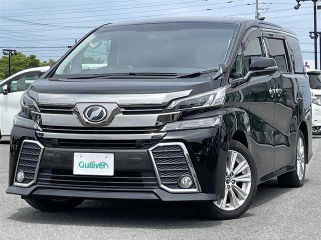 トヨタ ヴェルファイア Z Aエディション 道央・札幌 2016(平28)年 10.2万km ブラック ４WD/寒冷地仕様/社外メモリーナビ/CD/DVD/BT/フルセグ/社外フリップダウンモニター/プリクラッシュセーフティ/横滑り防止装置/レーダークルーズコントロール/クリアランスソナー/バックカメラ/ビルトインETC/アイドリングストップ/ワイパーデアイサー/ECOMODE/両側パワースライドドア/N席/２列目オットマン/革巻きステアリング/ステアリングリモコン/電動パーキング/ブレーキホールド/MTモード付AT/プッシュスタート/スマートキー/LEDヘッドライト/オートライト/フォグランプ/電動格納/ウィンカーミラー/純正フロアマット/ドアバイザー