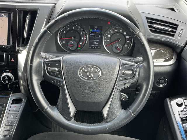 トヨタ ヴェルファイア Z Aエディション 道央・札幌 2016(平28)年 10.2万km ブラック ４WD/寒冷地仕様/社外メモリーナビ/CD/DVD/BT/フルセグ/社外フリップダウンモニター/プリクラッシュセーフティ/横滑り防止装置/レーダークルーズコントロール/クリアランスソナー/バックカメラ/ビルトインETC/アイドリングストップ/ワイパーデアイサー/ECOMODE/両側パワースライドドア/N席/２列目オットマン/革巻きステアリング/ステアリングリモコン/電動パーキング/ブレーキホールド/MTモード付AT/プッシュスタート/スマートキー/LEDヘッドライト/オートライト/フォグランプ/電動格納/ウィンカーミラー/純正フロアマット/ドアバイザー