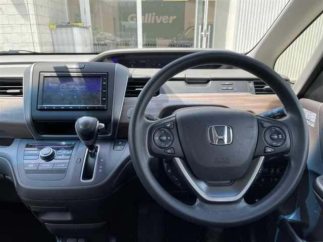 ホンダ フリード G 石川県 2022(令4)年 3.1万km 黒 純正メモリーナビ/バックカメラ/ビルトインETC/両側パワースライド/レーダークルーズ/ホンダセンシング/レーンキープ/前後ドライブレコーダー/ステアリングリモコン/スマートキー/プッシュスタート/電動ミラー/保証書/取説/スペアキー