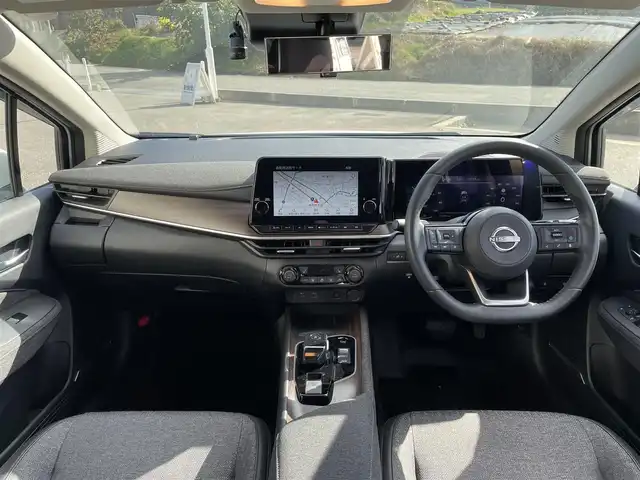 日産 オーラ 富山県 2023(令5)年 8.3万km ピュアホワイトパール アラウンドビューモニター／/純正８インチナビ／/フルセグＴＶ／/Ｂｌｕｅｔｏｏｔｈ／/プロパイロット／/ＢＯＳＥサウンド／/シートヒーター／/ステアリングヒーター／/ビルトインＥＴＣ２．０／/置くだけ充電／/純正ドラレコ/LEDオートライト/ステアスイッチ