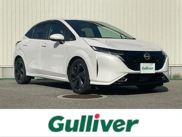 日産 オーラ 富山県 2023(令5)年 8.3万km ピュアホワイトパール アラウンドビューモニター／/純正８インチナビ／/フルセグＴＶ／/Ｂｌｕｅｔｏｏｔｈ／/プロパイロット／/ＢＯＳＥサウンド／/シートヒーター／/ステアリングヒーター／/ビルトインＥＴＣ２．０／/置くだけ充電／/純正ドラレコ/LEDオートライト/ステアスイッチ