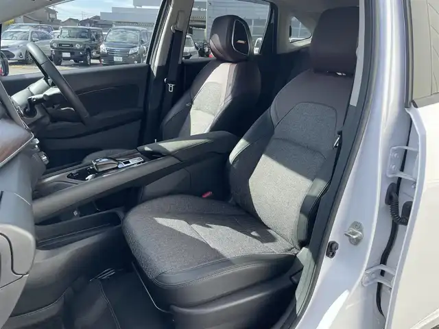 日産 オーラ 富山県 2023(令5)年 8.3万km ピュアホワイトパール アラウンドビューモニター／/純正８インチナビ／/フルセグＴＶ／/Ｂｌｕｅｔｏｏｔｈ／/プロパイロット／/ＢＯＳＥサウンド／/シートヒーター／/ステアリングヒーター／/ビルトインＥＴＣ２．０／/置くだけ充電／/純正ドラレコ/LEDオートライト/ステアスイッチ