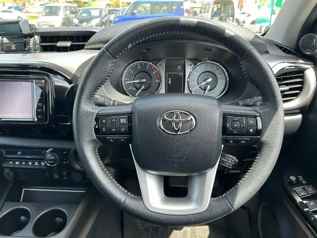 トヨタ ハイラックス Z 宮城県 2022(令4)年 5万km アティチュードブラックマイカ キャノピー付/プリクラッシュセーフティ/レーンディパーチャーアラート/ロードサインアシスト/先行車発進告知機能/クリアランスソナー/バックソナー/アクティブトラクションコントロール/ダウンヒルアシストコントロール制御/オートLSD/リアデフロック/レーダークルーズコントロール/純正ナビ（NSZT-W68T）/・CD/DVD/・Bluetooth/・フルセグTV/バックカメラ/ETC/革巻きステアリング/ステアリングスイッチ/MTモード付AT/LEDヘッドライト/フォグランプ/オートライト/スマートキー＆プッシュスタート/スペアキー/電動格納ミラー/純正17インチAW/フロアマット