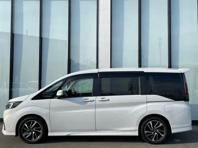 ホンダ ステップワゴン スパーダ クルスピセンシング 大阪府 2020(令2)年 4.6万km パール 純正１０インチナビ　/   フルセグＴＶ/ＥＴＣ２．０/フリップダウンモニター　/全方位モニター/前後ドライブレコーダー/追従走行有りクルーズコントロール/両側パワースライドドア/電動格納サードシート/シートヒーター/エアシート/ターボ   /エアロパーツ/LED /純正フロアマット/ホンダセンシング/横滑り防止装置/レーンキープアシスト/衝突軽減システム/盗難防止装置/カーテンエアバック/スマートキー/アイドリングストップ