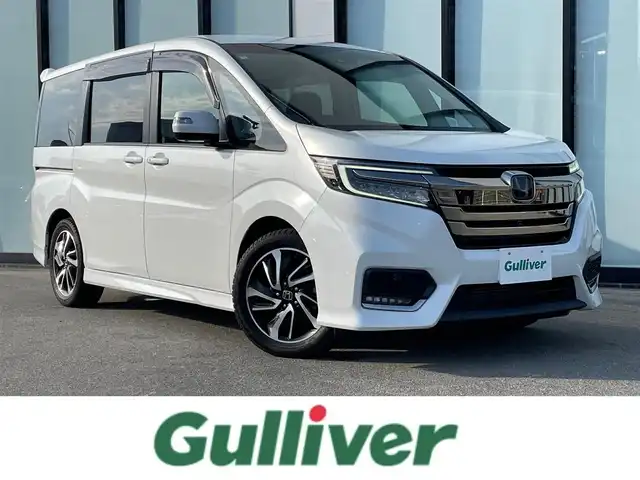 ホンダ ステップワゴン スパーダ クルスピセンシング 大阪府 2020(令2)年 4.6万km パール 純正１０インチナビ　/   フルセグＴＶ/ＥＴＣ２．０/フリップダウンモニター　/全方位モニター/前後ドライブレコーダー/追従走行有りクルーズコントロール/両側パワースライドドア/電動格納サードシート/シートヒーター/エアシート/ターボ   /エアロパーツ/LED /純正フロアマット/ホンダセンシング/横滑り防止装置/レーンキープアシスト/衝突軽減システム/盗難防止装置/カーテンエアバック/スマートキー/アイドリングストップ