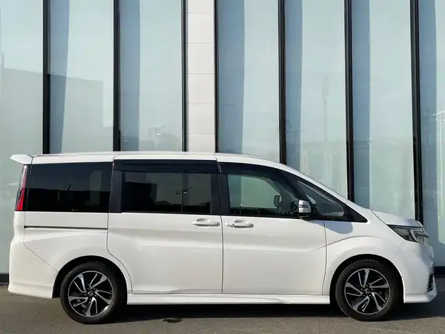ホンダ ステップワゴン スパーダ クルスピセンシング 大阪府 2020(令2)年 4.6万km パール 純正１０インチナビ　/   フルセグＴＶ/ＥＴＣ２．０/フリップダウンモニター　/全方位モニター/前後ドライブレコーダー/追従走行有りクルーズコントロール/両側パワースライドドア/電動格納サードシート/シートヒーター/エアシート/ターボ   /エアロパーツ/LED /純正フロアマット/ホンダセンシング/横滑り防止装置/レーンキープアシスト/衝突軽減システム/盗難防止装置/カーテンエアバック/スマートキー/アイドリングストップ