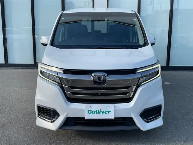 ホンダ ステップワゴン スパーダ クルスピセンシング 大阪府 2020(令2)年 4.6万km パール 純正１０インチナビ　/   フルセグＴＶ/ＥＴＣ２．０/フリップダウンモニター　/全方位モニター/前後ドライブレコーダー/追従走行有りクルーズコントロール/両側パワースライドドア/電動格納サードシート/シートヒーター/エアシート/ターボ   /エアロパーツ/LED /純正フロアマット/ホンダセンシング/横滑り防止装置/レーンキープアシスト/衝突軽減システム/盗難防止装置/カーテンエアバック/スマートキー/アイドリングストップ