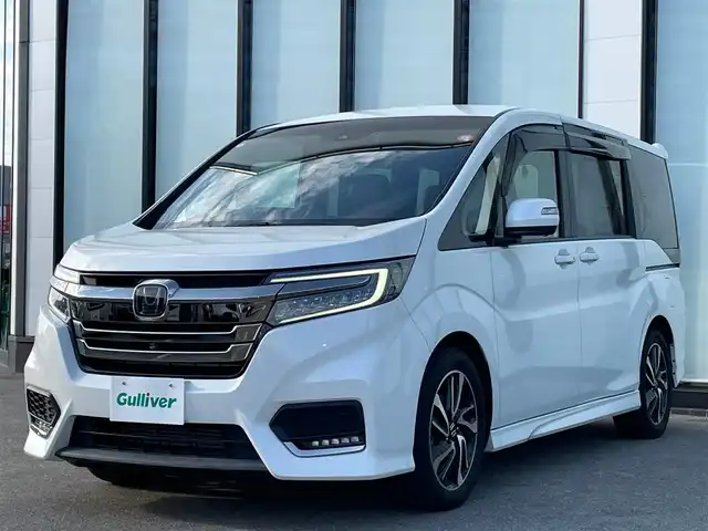 ホンダ ステップワゴン スパーダ クルスピセンシング 大阪府 2020(令2)年 4.6万km パール 純正１０インチナビ　/   フルセグＴＶ/ＥＴＣ２．０/フリップダウンモニター　/全方位モニター/前後ドライブレコーダー/追従走行有りクルーズコントロール/両側パワースライドドア/電動格納サードシート/シートヒーター/エアシート/ターボ   /エアロパーツ/LED /純正フロアマット/ホンダセンシング/横滑り防止装置/レーンキープアシスト/衝突軽減システム/盗難防止装置/カーテンエアバック/スマートキー/アイドリングストップ