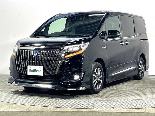 トヨタ エスクァイア ハイブリッド Gi プレミアムパッケージ ブラックテーラード 大阪府 2019(平31)年 1.2万km ブラック モデリスタエアロ 純正10incナビ(フルセグ/DVD再生/Bluetooth) バックカメラ ETC 両側パワースライドドア ハーフレザー シートヒーター 衝突軽減 クルコン トヨタセーフティセンス