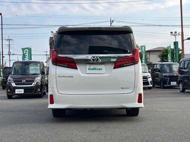 トヨタ アルファード S タイプゴールド 静岡県 2020(令2)年 5.8万km ホワイトパールクリスタルシャイン エンジンスタートボタン/保証書/取扱説明書/パワーステアリング/パワーウィンドウ/スマートキー/Wオートエアコン/スペアキー１本/クルーズコントロール/フリップダウンモニター/USB入力端子/ETC/バックカメラ/純正9インチSDナビ（BT/フルセグ）/三列シート/ドライブレコーダー前後/ウォークスルー/純正フロアマット/ハーフレザー/両側パワースライドドア/純正18インチアルミホイール/社外19インチアルミホイール（サマータイヤ）トランク内有/ABS/横滑り防止装置/コーナーセンサー前後/レーンキープアシスト/盗難防止装置/オートライト/オートマチックハイビーム/三眼LEDヘッドライト/Wプラスサイドエアバック/衝突軽減システム/カーテンエアバック/BSM(ブラインドスポットモニター)