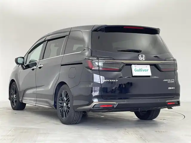ホンダ オデッセイ ハイブリッド e:HEVアブソルート EXブラックED 群馬県 2023(令5)年 1.3万km プレミアムヴィーナスブラックP 純正15.6インチフリップダウンモニター/＝＝＝＝＝/純正11.インチナビ/・AM/FM/CD/DVD/SD/Bluetooth/・USB/HDMI/AppleCarPlay/AndroidAuto/マルチビューカメラシステム/ホンダセンシング/・衝突軽減ブレーキ/近距離衝突軽減ブレーキ/・先行車発進お知らせ機能/・歩行者事故低減ステアリング/・路外逸脱抑制機能/・渋滞追従機能付アダプティブクルーズコントロール/・車線維持支援システム/・ブラインドスポットインフォメーション/・オートハイビーム/・標識認識機能/・誤発進抑制機能/後方誤発進抑制機能/・急アクセル抑制機能/後退出庫サポート/・パーキングセンサーシステム/両側パワースライドドア/ハンズフリーアクセスパワーテールゲート(予約ロック付)/本革シート/2列目両側アームレスト付4ウェイパワーシート(リクライニング/オットマン)/ひし2列目シートセンターテーブル(折りたたみ式・ドリンクホルダー付)/運転席8ウェイ 助手席4ウェイ パワーシート/運転席＆助手席シートヒーター＋2列目シートヒーター/18インチアルミホイール(マットベルリナブラック)