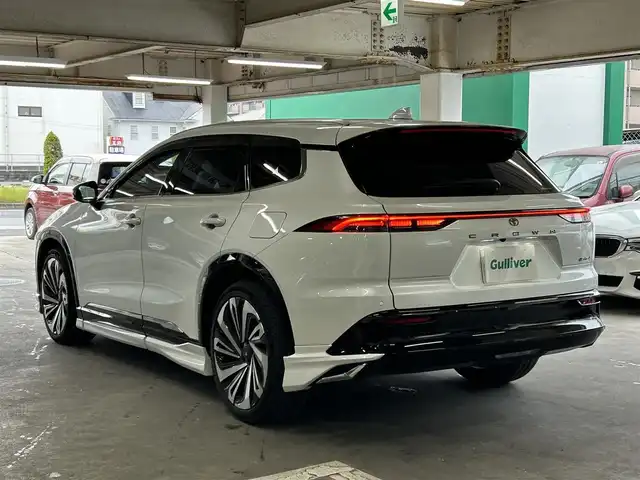 トヨタ クラウン エステート RS 道央・札幌 2025(令7)年 0.6万km プレシャスホワイトパール ワンオーナー/純正ディスプレイオーディオ(BT/タイプC/Miracast/Apple Carplay/Android Auto/FM/AM/フルセグ/)/フルモデリスタエアロ/ワイヤレス充電/ドラレコ前後/ガラスルーフ/ステアリングヒーター/エアシートD+N/シートヒーター全席/パワーバックドア/ETC2.0/AC100V充電/D＋NパワーシートD席メモリーシート付/黒レザーシート/モデリスタAW21インチ/トヨタセーフティセンス/PDA(プロアクティブドライビングアシスト)/HUD(ヘッドアップディスプレイ)/BSM(ブラインドスポットモニター)/PCS(プリクラッシュセーフティ)/SEA(安心降車システム)/ADAS(先進運転支援システム)/純正AW積載/スマートキー×2/保証書/取扱説明書
