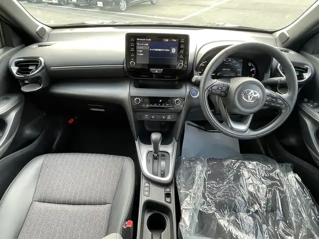 トヨタ ヤリスクロス ハイブリッド Z 愛媛県 2024(令6)年 1.4万km ブラックマイカ モデリスタエアロ/ディスプレイオーディオ/（AppleCarPlay/AndroidAuto）/アラウンドビューモニター　/レーダークルーズコントロール　/シートヒーター　/ステアリングヒーター　/衝突軽減システム　/LEDヘッドライト/オートハイビーム　/ブレーキホールド/前後コーナーセンサー/横滑り防止装置/レーンキープアシスト/盗難防止装置/純正18インチAW/スマートキー/USB・TypeC入力端子/ドライブ&EVモード選択