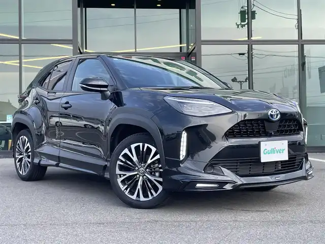 トヨタ ヤリスクロス ハイブリッド Z 愛媛県 2024(令6)年 1.4万km ブラックマイカ モデリスタエアロ/ディスプレイオーディオ/（AppleCarPlay/AndroidAuto）/アラウンドビューモニター　/レーダークルーズコントロール　/シートヒーター　/ステアリングヒーター　/衝突軽減システム　/LEDヘッドライト/オートハイビーム　/ブレーキホールド/前後コーナーセンサー/横滑り防止装置/レーンキープアシスト/盗難防止装置/純正18インチAW/スマートキー/USB・TypeC入力端子/ドライブ&EVモード選択