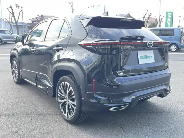 トヨタ ヤリスクロス ハイブリッド Z 愛媛県 2024(令6)年 1.4万km ブラックマイカ モデリスタエアロ/ディスプレイオーディオ/（AppleCarPlay/AndroidAuto）/アラウンドビューモニター　/レーダークルーズコントロール　/シートヒーター　/ステアリングヒーター　/衝突軽減システム　/LEDヘッドライト/オートハイビーム　/ブレーキホールド/前後コーナーセンサー/横滑り防止装置/レーンキープアシスト/盗難防止装置/純正18インチAW/スマートキー/USB・TypeC入力端子/ドライブ&EVモード選択