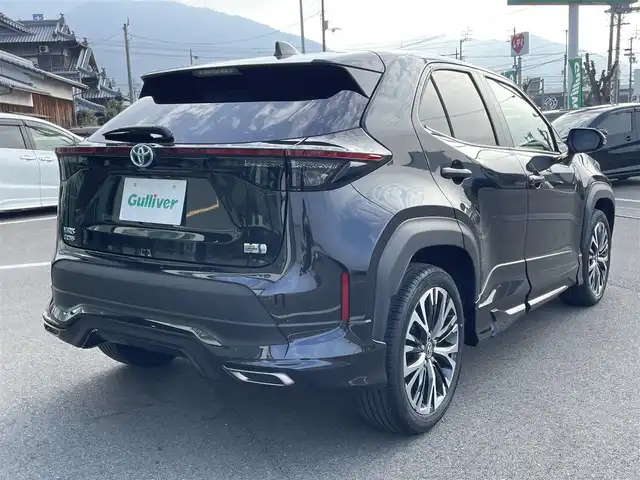 トヨタ ヤリスクロス ハイブリッド Z 愛媛県 2024(令6)年 1.4万km ブラックマイカ モデリスタエアロ/ディスプレイオーディオ/（AppleCarPlay/AndroidAuto）/アラウンドビューモニター　/レーダークルーズコントロール　/シートヒーター　/ステアリングヒーター　/衝突軽減システム　/LEDヘッドライト/オートハイビーム　/ブレーキホールド/前後コーナーセンサー/横滑り防止装置/レーンキープアシスト/盗難防止装置/純正18インチAW/スマートキー/USB・TypeC入力端子/ドライブ&EVモード選択