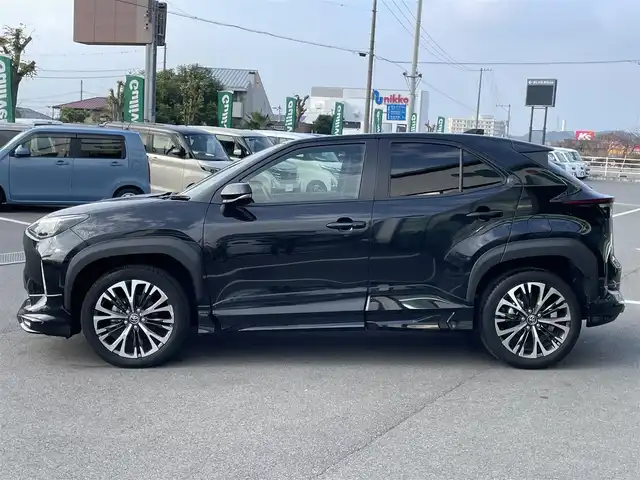 トヨタ ヤリスクロス ハイブリッド Z 愛媛県 2024(令6)年 1.4万km ブラックマイカ モデリスタエアロ/ディスプレイオーディオ/（AppleCarPlay/AndroidAuto）/アラウンドビューモニター　/レーダークルーズコントロール　/シートヒーター　/ステアリングヒーター　/衝突軽減システム　/LEDヘッドライト/オートハイビーム　/ブレーキホールド/前後コーナーセンサー/横滑り防止装置/レーンキープアシスト/盗難防止装置/純正18インチAW/スマートキー/USB・TypeC入力端子/ドライブ&EVモード選択