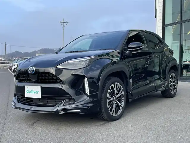 トヨタ ヤリスクロス ハイブリッド Z 愛媛県 2024(令6)年 1.4万km ブラックマイカ モデリスタエアロ/ディスプレイオーディオ/（AppleCarPlay/AndroidAuto）/アラウンドビューモニター　/レーダークルーズコントロール　/シートヒーター　/ステアリングヒーター　/衝突軽減システム　/LEDヘッドライト/オートハイビーム　/ブレーキホールド/前後コーナーセンサー/横滑り防止装置/レーンキープアシスト/盗難防止装置/純正18インチAW/スマートキー/USB・TypeC入力端子/ドライブ&EVモード選択